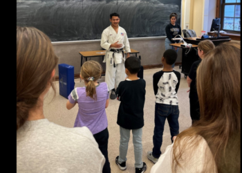 Rickyjon Balgenorth teaching karate to elementary school students with the Purdue Karate Club